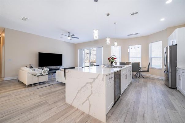 Dining room, Interior, Kitchen, Living room, Pendant Lights, Recessed Lighting, Wood Texture Flooring