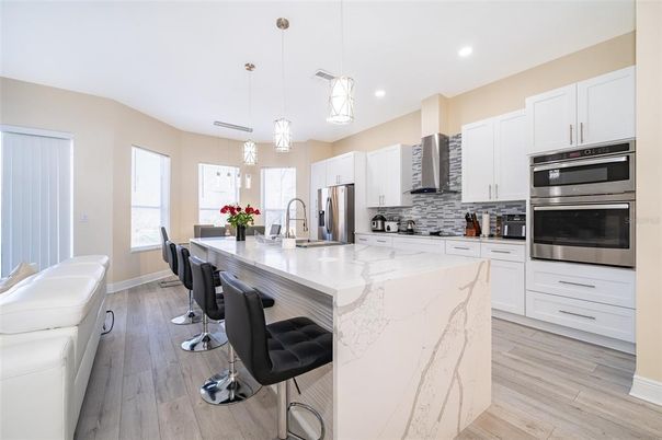 Interior, Kitchen, Pendant Lights, Recessed Lighting, Stainless Steel Appliances, Wood Texture Flooring