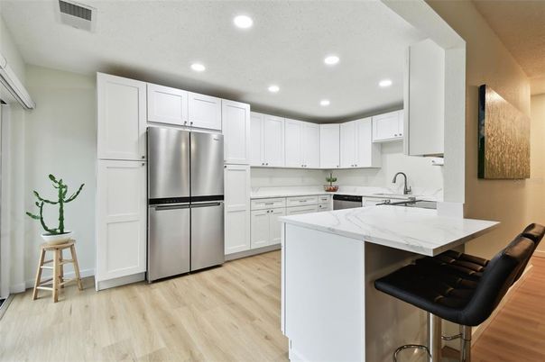 Interior, Kitchen, Recessed Lighting, Stainless Steel Appliances, Wood Texture Flooring