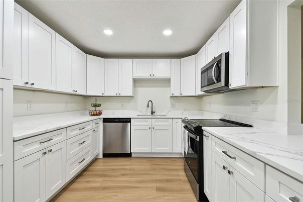 Interior, Kitchen, Recessed Lighting, Stainless Steel Appliances, Wood Texture Flooring