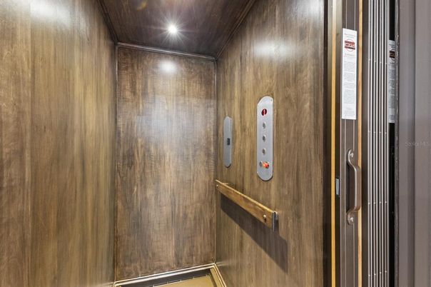 Elevator, Interior, Recessed Lighting, Wooden Walls