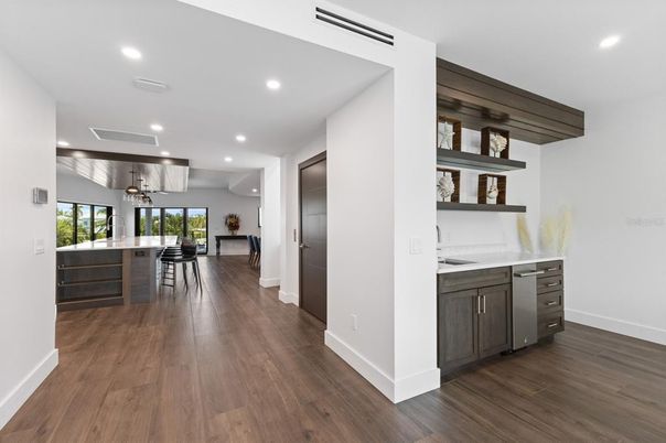 Chandelier, Interior, Kitchen, Pendant Lights, Recessed Lighting, Stainless Steel Appliances, Wood Texture Flooring