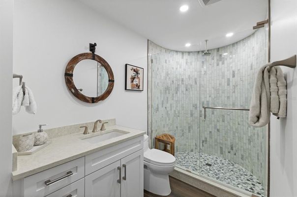 Bathroom, Glass Shower, Interior, Recessed Lighting, Wood Texture Flooring