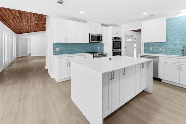 Interior, Kitchen, Recessed Lighting, Stainless Steel Appliances, Wood Texture Flooring