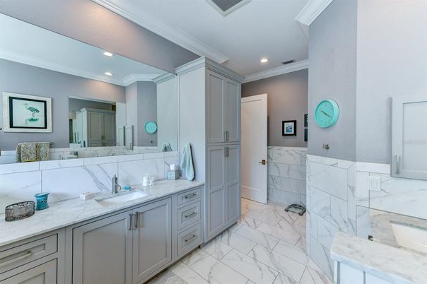 Bathroom, Dual Sink Vanities, Interior, Marble, Marble Walls, Recessed Lighting