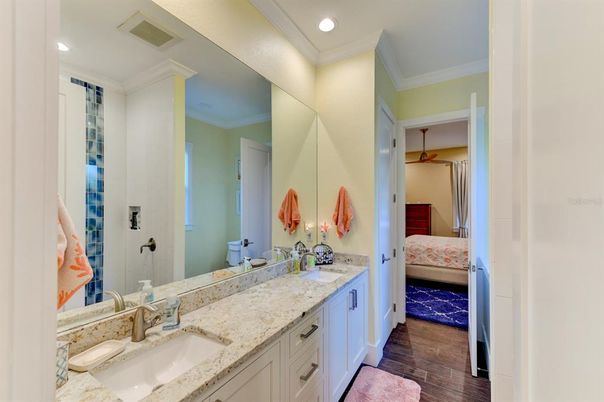 Bathroom, Bedroom, Dual Sink Vanities, Interior, Recessed Lighting, Wood Texture Flooring