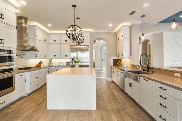 Chandelier, Interior, Kitchen, Pendant Lights, Recessed Lighting, Stainless Steel Appliances, Wood Texture Flooring