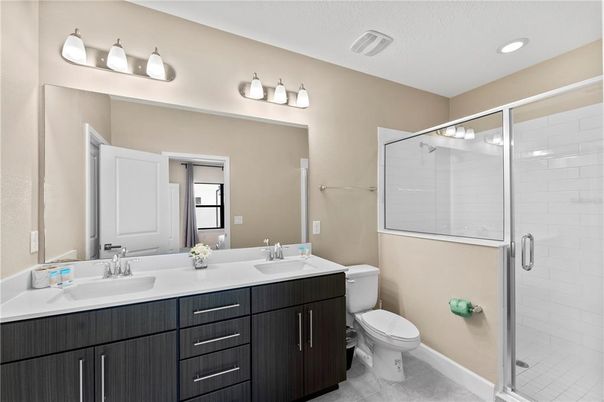 Bathroom, Dual Sink Vanities, Glass Shower, Interior, Recessed Lighting
