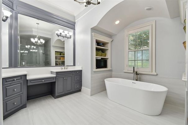 Bathroom, Chandelier, Dual Sink Vanities, Free Standing Baths, Interior, Recessed Lighting