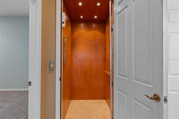 Elevator, Interior, Recessed Lighting, Wooden Ceilings, Wooden Walls