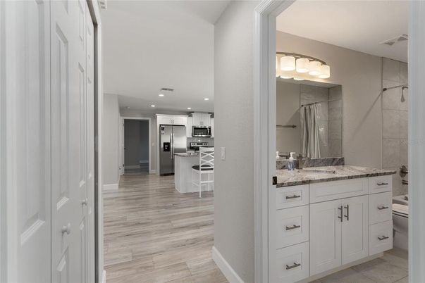 Interior, Kitchen, Recessed Lighting, Stainless Steel Appliances, Wood Texture Flooring