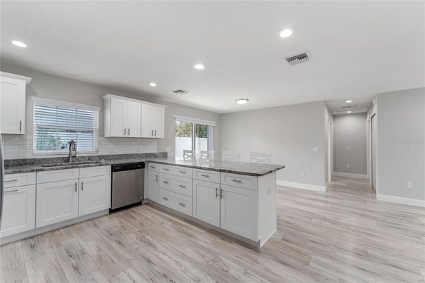 Interior, Kitchen, Recessed Lighting, Stainless Steel Appliances, Wood Texture Flooring