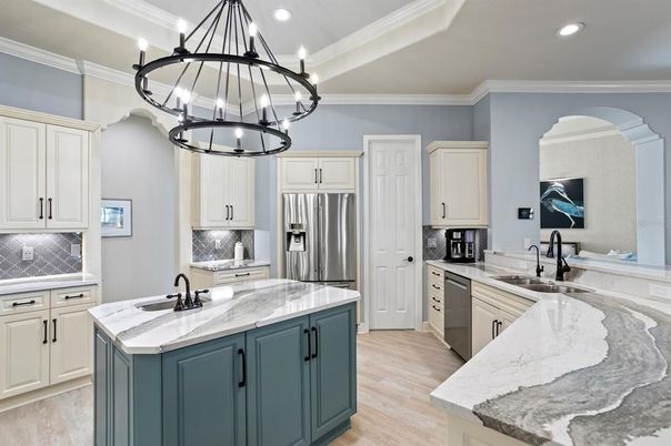 Chandelier, Interior, Kitchen, Pendant Lights, Recessed Lighting, Stainless Steel Appliances, Wood Texture Flooring