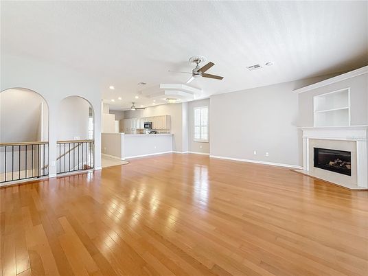 Empty room, Fireplace, Interior, Kitchen, Recessed Lighting, Wood Texture Flooring