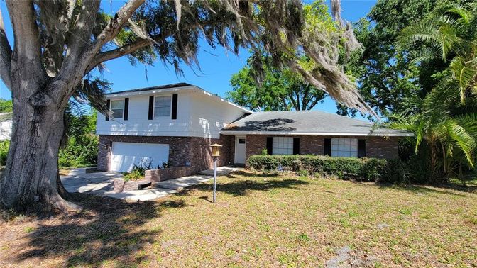Attached, Backyard, Exterior, Facade, Brick Facade, Split Level