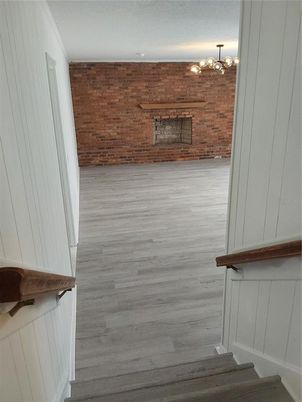 Empty room, Fireplace, Interior, Stone Walls, Wood Texture Flooring