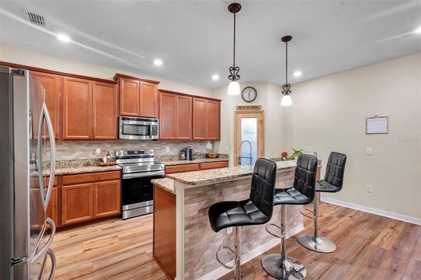 Interior, Kitchen, Pendant Lights, Recessed Lighting, Stainless Steel Appliances, Wood Texture Flooring