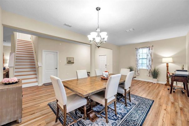 Chandelier, Dining room, Interior, Piano, Wood Texture Flooring