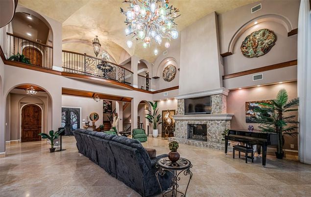 Chandelier, Fireplace, Interior, Living room, Piano, Recessed Lighting