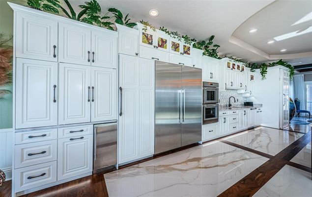 Interior, Kitchen, Marble, Recessed Lighting, Stainless Steel Appliances, Wood Texture Flooring