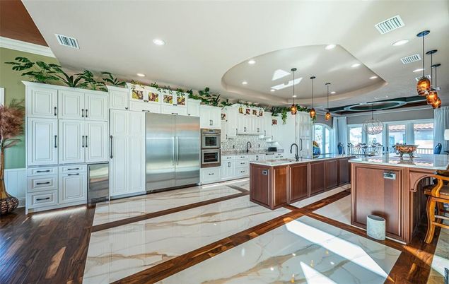 Interior, Kitchen, Marble, Pendant Lights, Recessed Lighting, Stainless Steel Appliances, Wood Texture Flooring