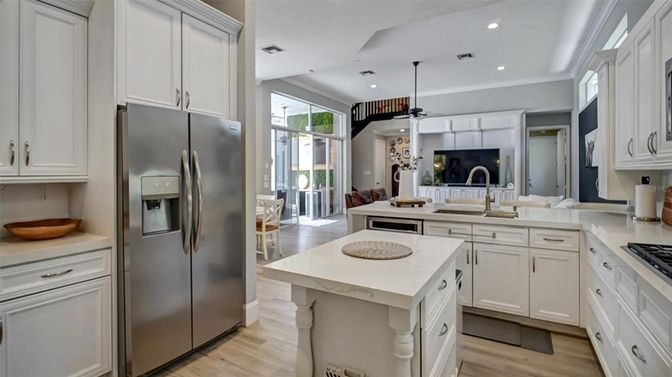 Dining room, Interior, Kitchen, Living room, Pendant Lights, Recessed Lighting, Stainless Steel Appliances, Wood Texture Flooring