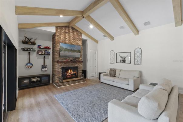 Fireplace, Interior, Living room, Recessed Lighting, Stone Walls, Wooden Beams, Wood Texture Flooring