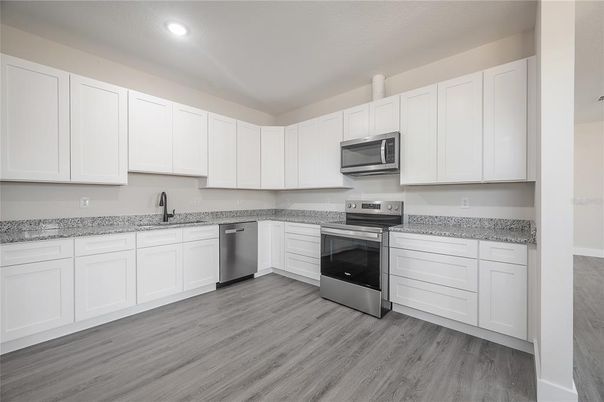 Interior, Kitchen, Recessed Lighting, Stainless Steel Appliances, Wood Texture Flooring