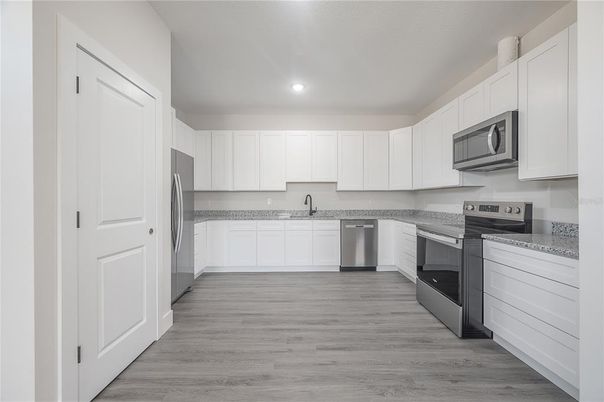 Interior, Kitchen, Recessed Lighting, Stainless Steel Appliances, Wood Texture Flooring