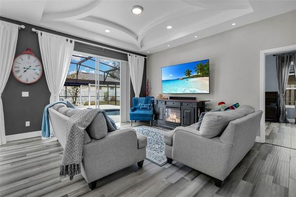 Fireplace, Interior, Living room, Recessed Lighting, Wood Texture Flooring