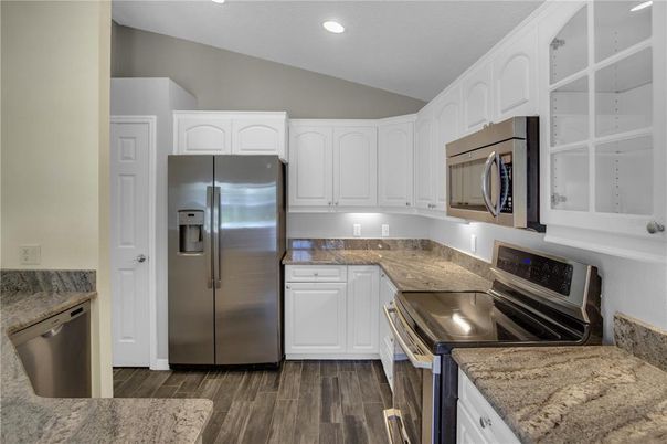 Interior, Kitchen, Recessed Lighting, Stainless Steel Appliances, Wood Texture Flooring