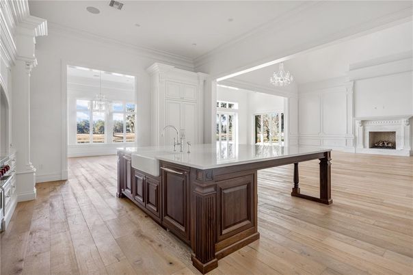 Chandelier, Fireplace, Interior, Kitchen, Pendant Lights, Recessed Lighting, Wood Texture Flooring