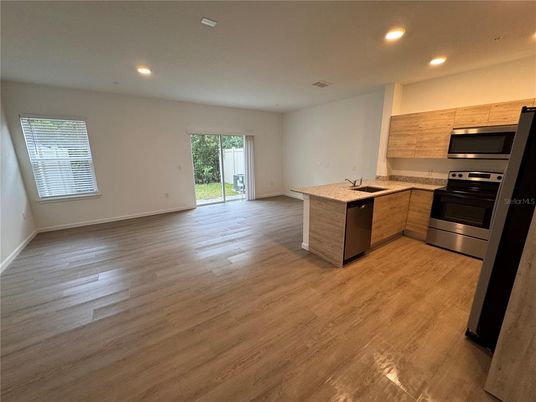Interior, Kitchen, Recessed Lighting, Stainless Steel Appliances, Wood Texture Flooring