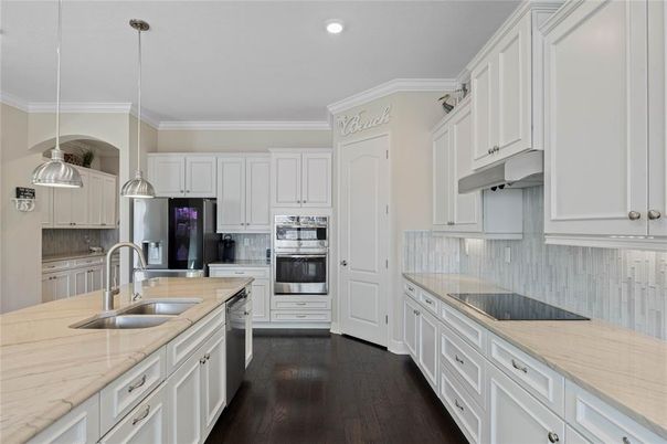 Interior, Kitchen, Pendant Lights, Recessed Lighting, Stainless Steel Appliances, Wood Texture Flooring