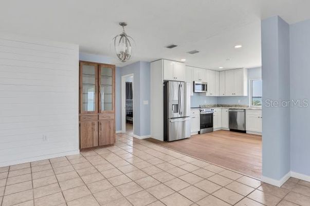 Chandelier, Interior, Kitchen, Recessed Lighting, Stainless Steel Appliances, Wood Texture Flooring