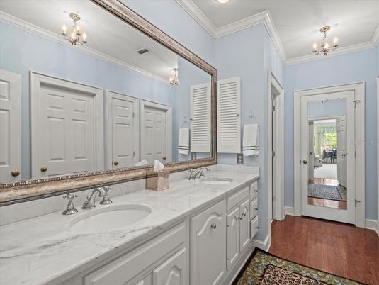Bathroom, Dual Sink Vanities, Interior, Recessed Lighting, Wood Texture Flooring