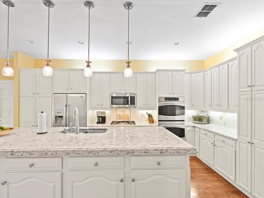 Interior, Kitchen, Pendant Lights, Recessed Lighting, Stainless Steel Appliances, Wood Texture Flooring