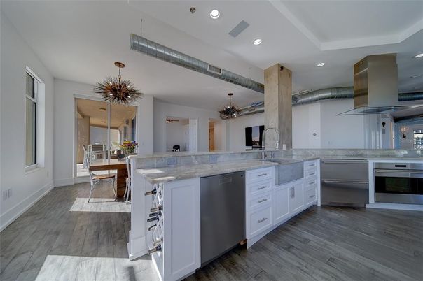 Dining room, Interior, Kitchen, Pendant Lights, Recessed Lighting, Stainless Steel Appliances, Wood Texture Flooring
