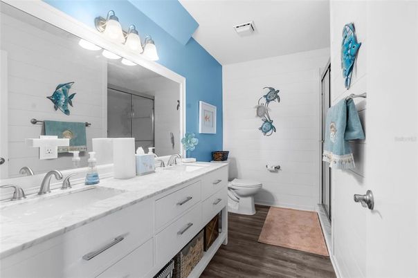 Bathroom, Dual Sink Vanities, Glass Shower, Interior, Wood Texture Flooring