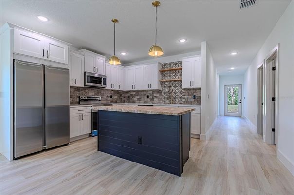 Interior, Kitchen, Pendant Lights, Recessed Lighting, Stainless Steel Appliances, Wood Texture Flooring