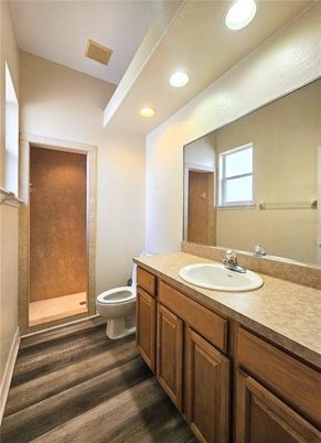Bathroom, Dual Sink Vanities, Interior, Recessed Lighting, Wood Texture Flooring