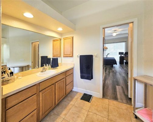 Bathroom, Dual Sink Vanities, Interior, Recessed Lighting, Wood Texture Flooring