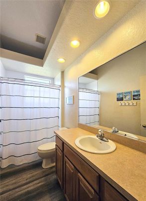 Bathroom, Dual Sink Vanities, Interior, Recessed Lighting, Wood Texture Flooring