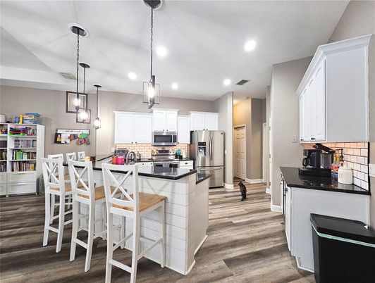 Interior, Kitchen, Pendant Lights, Recessed Lighting, Stainless Steel Appliances, Wood Texture Flooring
