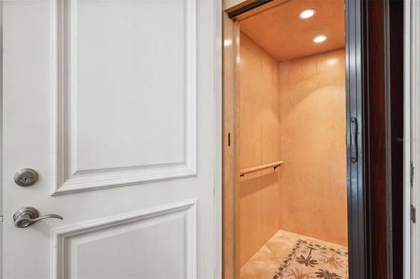 Elevator, Interior, Recessed Lighting, Wooden Ceilings, Wooden Walls