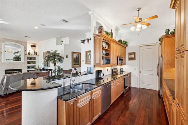Fireplace, Interior, Kitchen, Recessed Lighting, Wood Texture Flooring