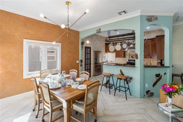 Dining room, Interior, Kitchen, Pendant Lights, Recessed Lighting, Stainless Steel Appliances, Wood Texture Flooring