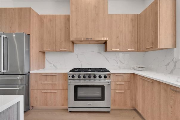 Interior, Kitchen, Marble Walls, Stainless Steel Appliances, Wood Texture Flooring