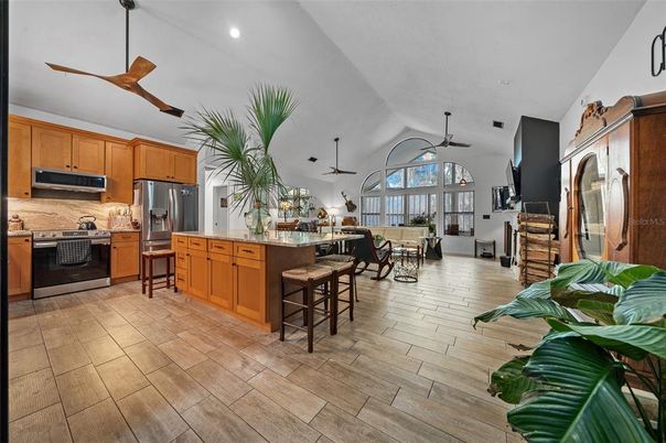 Dining room, Interior, Kitchen, Recessed Lighting, Stainless Steel Appliances, Wood Texture Flooring