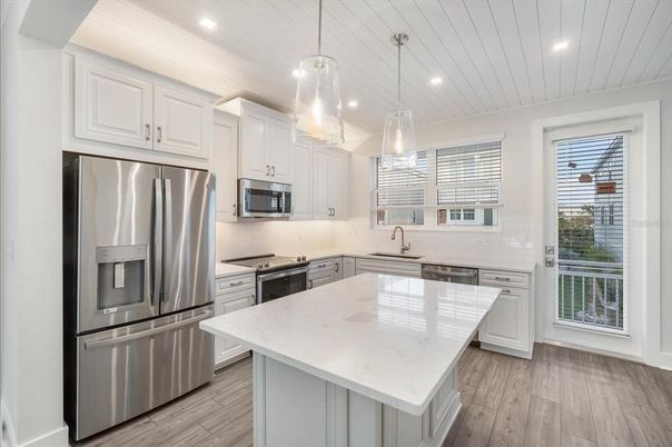 Interior, Kitchen, Pendant Lights, Recessed Lighting, Stainless Steel Appliances, Wood Texture Flooring